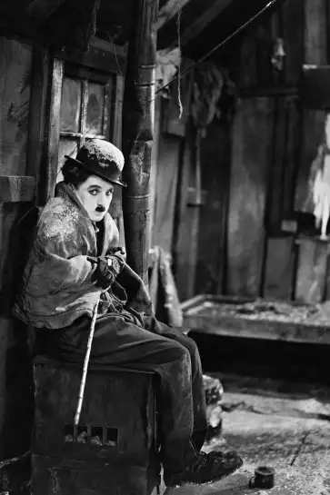 Charlie Chaplin dans La ruée vers l'or - affiche acteurs et actrices celebres
