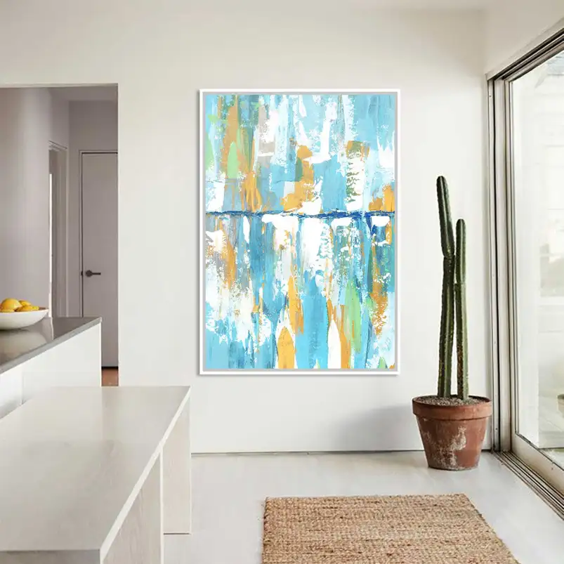 Une affiche abstraite mêlant nuances de bleu et touches dorées pour une décoration murale contemporaine et raffinée.