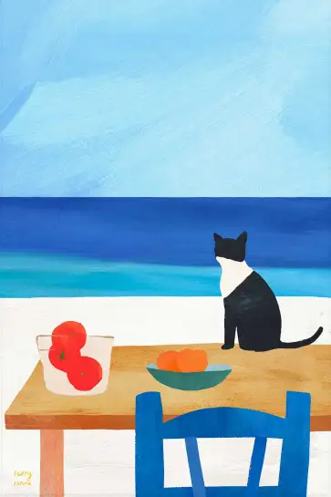 Chat noir et blanc face à la mer, instant méditerranéen